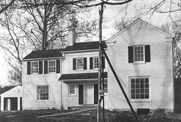 1950s with original house on right 